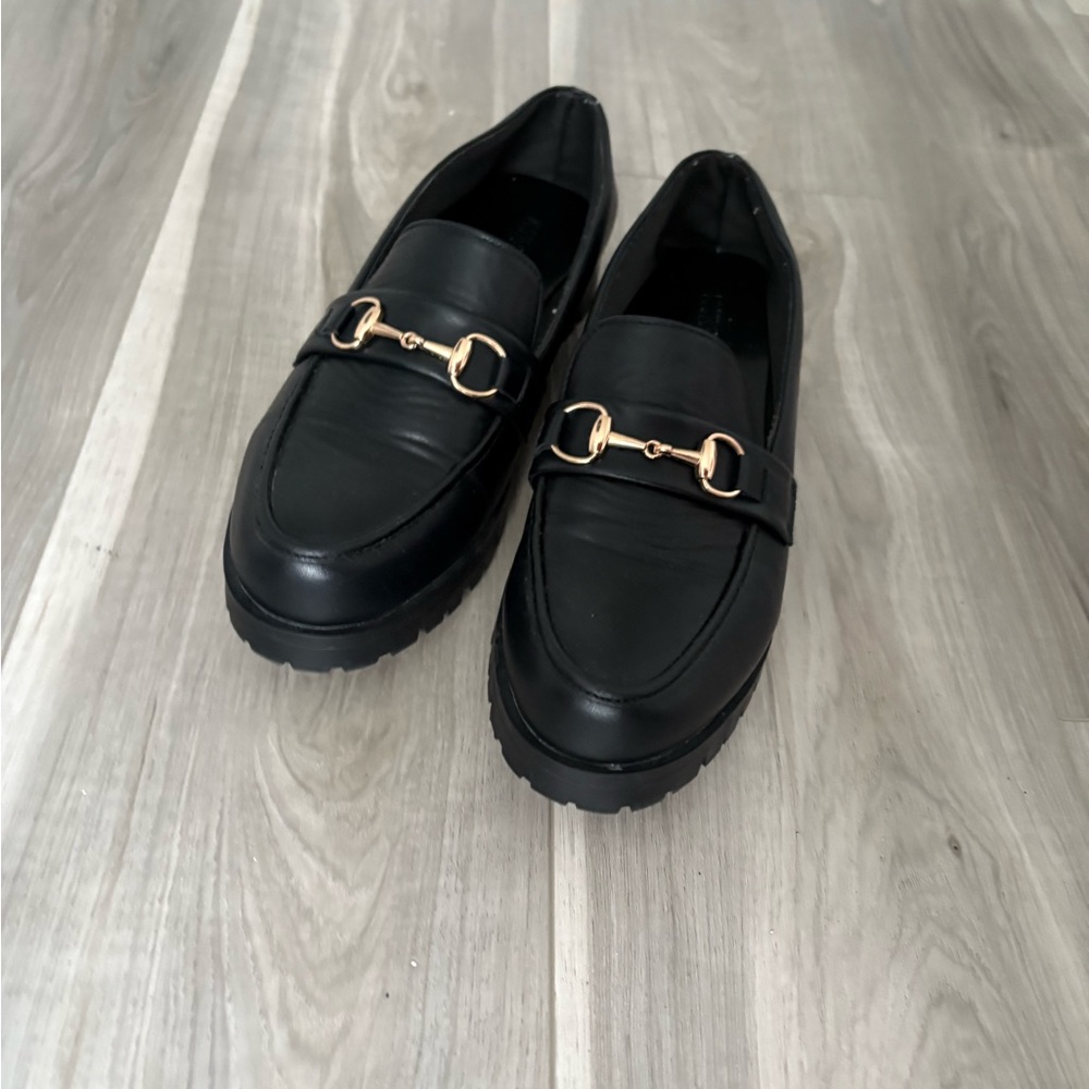 Elegant Black Loafers with Gold Accent